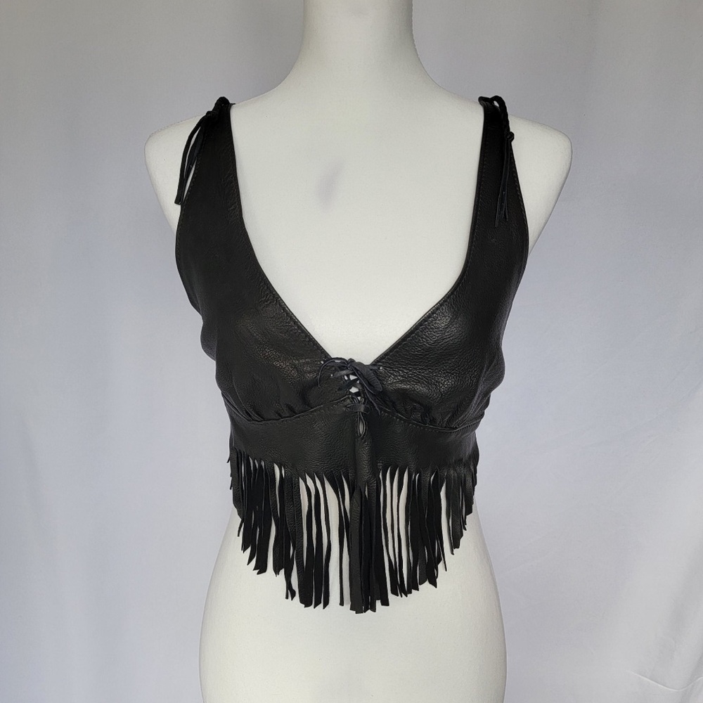 Braided leather straps
Vintage laced leather halter top - Picture 2 of 4